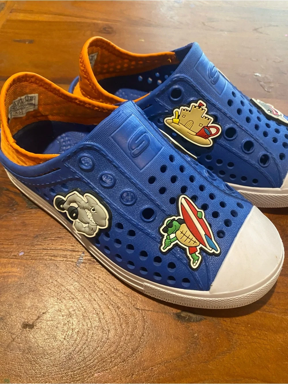 Skechers Kids Blue Slip-On Water Shoes with Orange Trim and Fun Charms